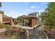 Landscaped backyard with a gazebo, patio and rock garden at 5842 High Timber Cir, Castle Rock, CO 80104