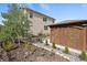 Backyard features a gazebo, rock garden, and lush landscaping at 5842 High Timber Cir, Castle Rock, CO 80104