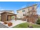 Backyard with a wooden patio, gazebo, and manicured lawn at 5842 High Timber Cir, Castle Rock, CO 80104