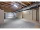 Unfinished basement with exposed beams and concrete flooring offers potential at 5842 High Timber Cir, Castle Rock, CO 80104