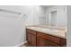 Bathroom features a double sink vanity, a large mirror, and modern fixtures at 5842 High Timber Cir, Castle Rock, CO 80104