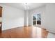 Bright dining area with hardwood floors and sliding glass doors at 5842 High Timber Cir, Castle Rock, CO 80104