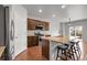 Kitchen featuring stainless steel appliances, granite countertops, and a spacious island with seating at 5842 High Timber Cir, Castle Rock, CO 80104