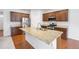 Beautiful kitchen with a large island and modern appliances at 5842 High Timber Cir, Castle Rock, CO 80104
