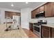 Kitchen features stainless steel appliances, granite countertops, and ample cabinet space for storage at 5842 High Timber Cir, Castle Rock, CO 80104