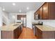 Spacious kitchen with stainless steel appliances and granite countertops at 5842 High Timber Cir, Castle Rock, CO 80104