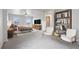 Bright main bedroom showcasing modern decor, natural light, a ceiling fan, and a bookshelf at 5842 High Timber Cir, Castle Rock, CO 80104