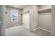 Walk-in closet with built-in shelving and a window to allow natural light in while organizing your wardrobe at 5842 High Timber Cir, Castle Rock, CO 80104