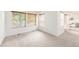 Bright bedroom featuring large windows with wood blinds and neutral carpeting at 6700 W Dorado Dr # 41, Littleton, CO 80123