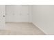 Bedroom featuring carpeted floors, white trim and a double door closet at 6700 W Dorado Dr # 41, Littleton, CO 80123