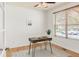 Well-lit office featuring a desk, chair, window with blinds, and a ceiling fan for added comfort at 6700 W Dorado Dr # 41, Littleton, CO 80123