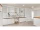 Charming office space with white built-in shelves, cabinets, and brown countertop, perfect for a home office at 6700 W Dorado Dr # 41, Littleton, CO 80123