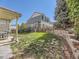 Fenced backyard with a retaining wall, offering privacy and outdoor enjoyment at 2508 Coach House Loop, Castle Rock, CO 80109