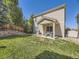 Beautifully maintained backyard with a covered patio area, ideal for outdoor dining at 2508 Coach House Loop, Castle Rock, CO 80109