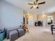 Bright bonus room featuring neutral carpet, ceiling fan, and ample space for flexible living at 2508 Coach House Loop, Castle Rock, CO 80109