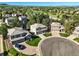 Aerial view of homes in a cul-de-sac with a golf course nearby at 6242 Shea Pl, Highlands Ranch, CO 80130