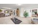 Spacious basement features neutral carpet and leads to another room at 6242 Shea Pl, Highlands Ranch, CO 80130