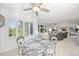 Inviting breakfast nook area with views of the lush landscape and access to the main living area at 6242 Shea Pl, Highlands Ranch, CO 80130