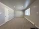 Bright bedroom featuring carpeted floors and neutral walls at 3705 Quail St # 4, Wheat Ridge, CO 80033