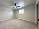 Carpeted bedroom with ceiling fan and neutral walls at 3705 Quail St # 4, Wheat Ridge, CO 80033