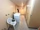 Shared laundry room with coin-operated washer and dryer at 3705 Quail St # 4, Wheat Ridge, CO 80033