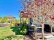 Spacious backyard deck perfect for outdoor dining and entertaining with landscaped yard at 10995 Quintero St, Commerce City, CO 80022