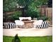 Cozy backyard fire pit area with comfortable seating, perfect for outdoor entertaining and relaxation at 10995 Quintero St, Commerce City, CO 80022