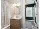 Modern bathroom with a shower and tub combination and a contemporary vanity at 1456 Syracuse St, Denver, CO 80220