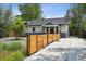 Exterior showcasing a charming home with a well-maintained fence and inviting curb appeal at 1456 Syracuse St, Denver, CO 80220