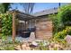 Charming backyard patio featuring a pergola, privacy screen, and comfortable seating, ideal for relaxation at 1456 Syracuse St, Denver, CO 80220