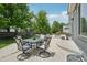 Outdoor patio featuring a dining set and ample seating for gatherings and entertaining at 6553 S Sedalia St, Aurora, CO 80016