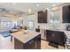 Open-concept layout with a modern kitchen, dining area, and inviting living space filled with natural light at 10071 Belvedere Cir, Lone Tree, CO 80124