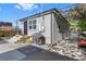 Backyard featuring a patio with outdoor seating, a covered grill, and lush landscaping at 785 Dexter St, Denver, CO 80220