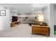 Spacious basement with recessed lighting, a large entertainment center, and comfortable seating at 785 Dexter St, Denver, CO 80220