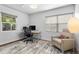 Office with desk, chair, and lounge area, featuring great natural light at 785 Dexter St, Denver, CO 80220