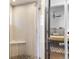 Modern shower with tiled walls, mosaic floor, and glass door at 785 Dexter St, Denver, CO 80220