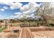Enjoy the spacious backyard with its tiered deck feature, garden beds, and a view of the neighborhood at 3607 Dinosaur St, Castle Rock, CO 80109