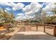 Spacious backyard featuring a tiered deck feature and garden beds from the home's back patio at 3607 Dinosaur St, Castle Rock, CO 80109