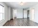 Spacious bedroom featuring hardwood floors, neutral paint and large windows at 3607 Dinosaur St, Castle Rock, CO 80109
