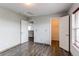 Neutral bedroom showcasing hardwood floors and multiple closets at 3607 Dinosaur St, Castle Rock, CO 80109