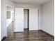 Neutral bedroom showcasing hardwood floors and closet at 3607 Dinosaur St, Castle Rock, CO 80109
