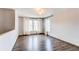 Bright bedroom with hardwood floors and large windows at 3607 Dinosaur St, Castle Rock, CO 80109