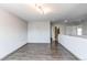 Open living area with hardwood floors and neutral paint at 3607 Dinosaur St, Castle Rock, CO 80109