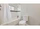 Clean bathroom features a shower-tub combo with sleek tiled walls at 1270 S Tennyson St, Denver, CO 80219
