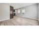 Bright living room with wood floors, fresh paint, and updated windows at 1270 S Tennyson St, Denver, CO 80219