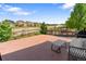 Wide patio with views of the neighborhood, plus lounge seating, outdoor grilling, and a firepit at 7410 S Old Hammer Way, Aurora, CO 80016