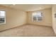 Neutral bedroom with carpet, large window, and natural light at 13351 Olive Way, Thornton, CO 80602