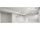 Spacious unfinished basement with recessed lighting and carpeted floors at 601 Jackson St, Denver, CO 80206