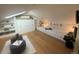 Charming bedroom with built-in shelving, cabinets, and shiplap accent wall at 601 Jackson St, Denver, CO 80206