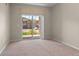 Bedroom featuring a sliding glass door with access to the outside at 7440 S Blackhawk St # 104, Englewood, CO 80112